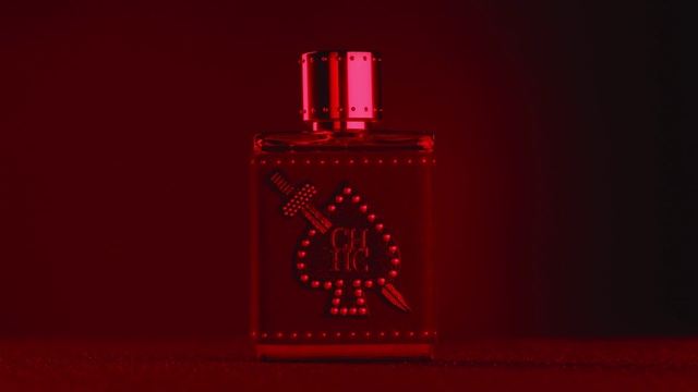 Video Reference: Perfume, Red, Product, Bottle, Liquid, Fluid, Glass bottle, Still life photography, Cosmetics