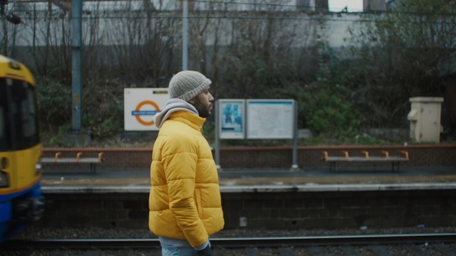 Video Reference: Yellow, Standing, Snapshot, Transport, Outerwear, Fun, Photography, Headgear, Temple, Asphalt, Person