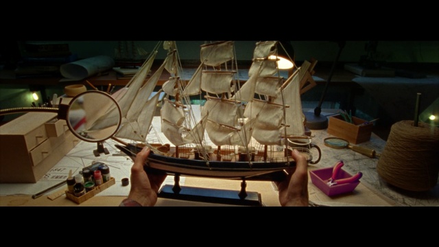 Video Reference: table, screenshot, furniture, recreation, space, Person