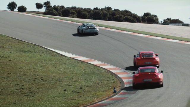 Video Reference: Land vehicle, Vehicle, Asphalt, Race track, Car, Mode of transport, Lane, Race car, Automotive design, Motorsport