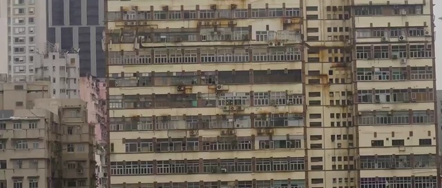 Video Reference: building, urban area, tower block, city, skyscraper, metropolis, residential area, condominium, neighbourhood, facade