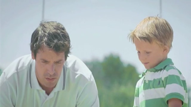 Video Reference: man, male, child, boy, human, grass, human behavior, father, play, fun, Person