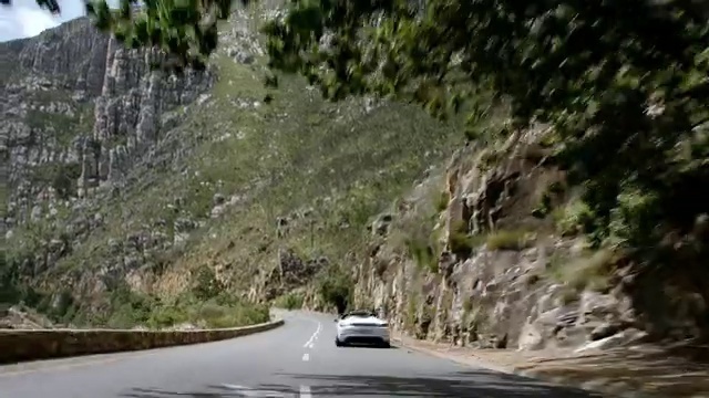 Video Reference: Land vehicle, Plant, Vehicle, Car, Infrastructure, Road surface, Mountain, Asphalt, Slope, Thoroughfare