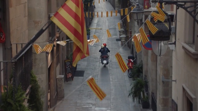 Video Reference: town, alley, street, building, city, Person