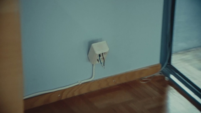 Video Reference: Wall, Hardwood, Floor, Electrical wiring, Room, Wood, Plaster, Flooring, Laminate flooring, Electronic device