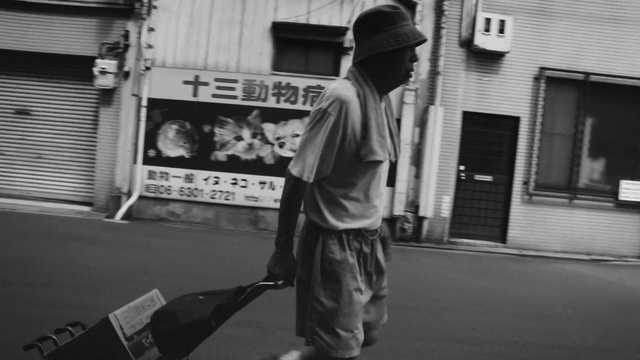 Video Reference: Photograph, Black, Black-and-white, Snapshot, Standing, Monochrome, Photography, Monochrome photography, Street, Street fashion, Person