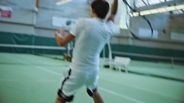 Video Reference: sport venue, sports, leisure, ball game, racquet sport, competition event, player, fun, indoor games and sports, tournament