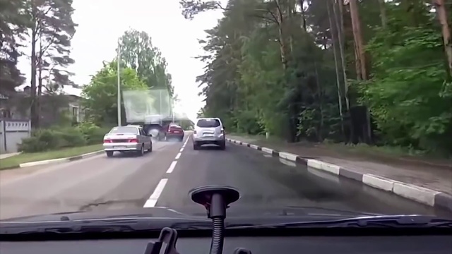 Video Reference: Road, Motor vehicle, Lane, Mode of transport, Asphalt, Vehicle, Windshield, Thoroughfare, Automotive exterior, Road surface