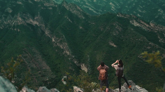 Video Reference: Mountain, Shorts, Highland, Plant, People in nature, Terrain, Travel, Mountainous landforms, Valley, Landscape
