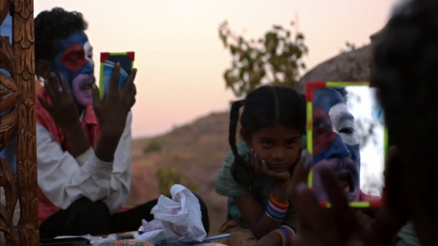 Video Reference: crowd, temple, tradition, girl, ritual, travel, event, recreation, fun, tourism, Person