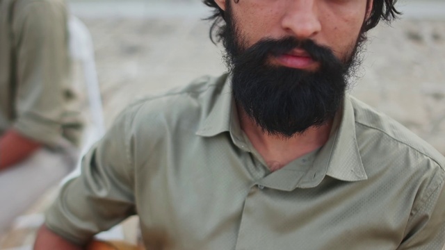 Video Reference: Forehead, Mouth, Beard, Dress shirt, Sleeve, Facial hair, People, Moustache, Collar, T-shirt