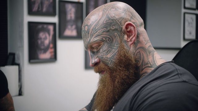 Video Reference: Facial hair, Beard, Skin, Head, Chin, Human, Forehead, Flesh, Mouth, Tattoo