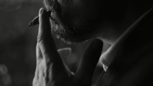 Video Reference: Black, Black-and-white, Monochrome photography, Nose, Hand, Monochrome, Lip, Photography, Neck, Close-up