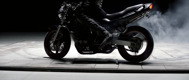 Video Reference: land vehicle, motorcycle, motor vehicle, vehicle, car, wheel, automotive design, automotive wheel system, automotive tire, motorcycle accessories