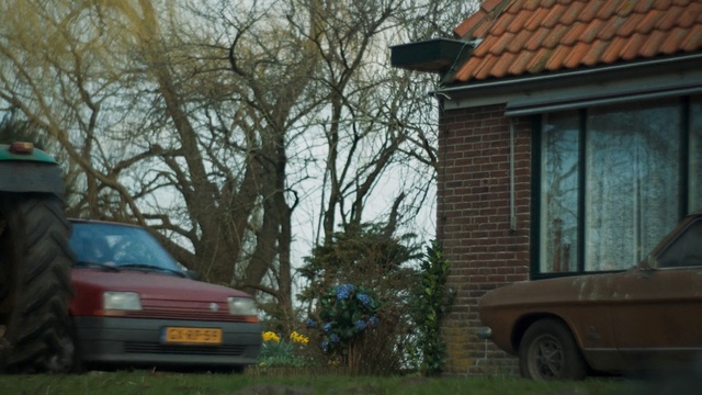 Video Reference: Land vehicle, Vehicle, Car, Citroën bx, Automotive exterior, City car, Vehicle door, Sedan, House, Mid-size car, Person