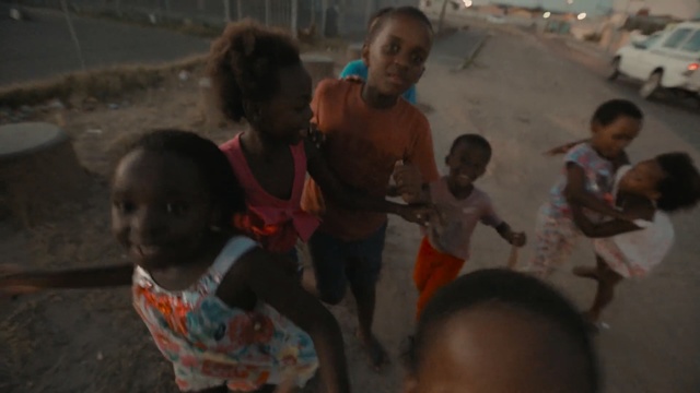 Video Reference: people, child, youth, temple, girl, crowd, fun, recreation, Person