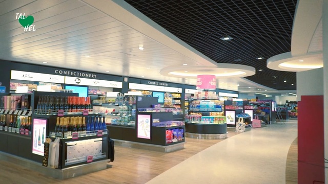 Video Reference: Building, Outlet store, Retail, Interior design, Ceiling, Bookselling, Shopping mall, Convenience store, Shelf, Floor, Indoor, Airport, Luggage, Library, Bus, Filled, Station, Large, People, Sitting, Passenger, Food, Cart, Suitcase, Table, Standing, Waiting, Room, Man, Woman, Group, Counter, Video, Living, White, City, Parked, Text, Store, Interior, Shop, Mall, Book