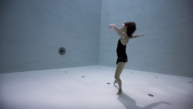 Video Reference: girl, joint, fun, recreation, floor, flooring, space, Person