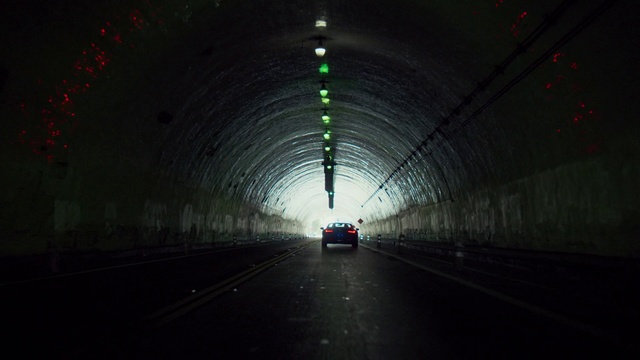 Video Reference: Tunnel, Darkness, Light, Infrastructure, Mode of transport, Road, Line, Night, Thoroughfare, Sky