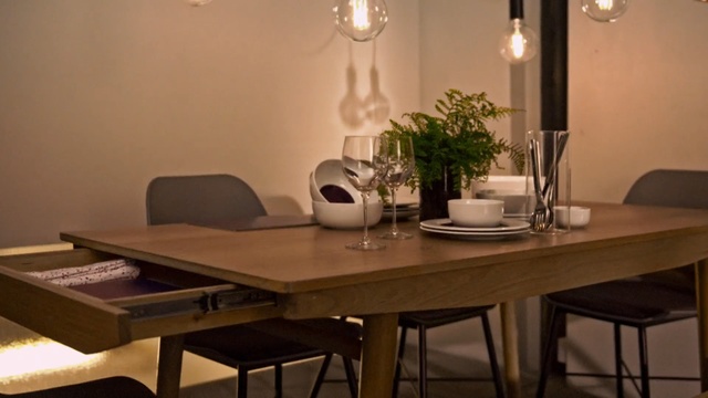 Video Reference: table, furniture, room, dining room, interior design, light fixture, chair