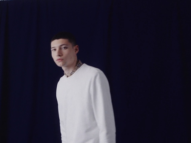 Video Reference: White, Neck, Fashion, Human, T-shirt, Photography, Sleeve, Outerwear, Performance, Gentleman, Person