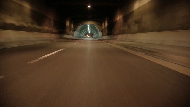 Video Reference: Tunnel, Road, Mode of transport, Infrastructure, Lane, Thoroughfare, Asphalt, Subway, Automotive lighting, Architecture