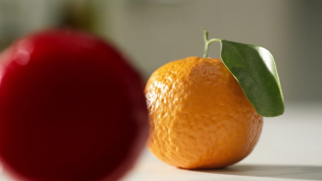 Video Reference: fruit, clementine, mandarin orange, orange, produce, citrus, tangerine, food, vegetarian food, tangelo