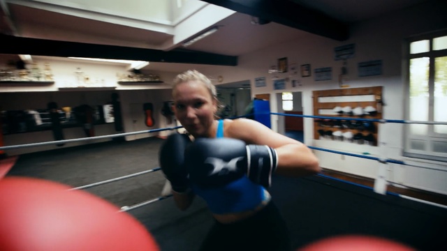 Video Reference: Boxing, Boxing glove, Sport venue, Gym, Arm, Individual sports, Room, Physical fitness, Boxing ring, Sports training