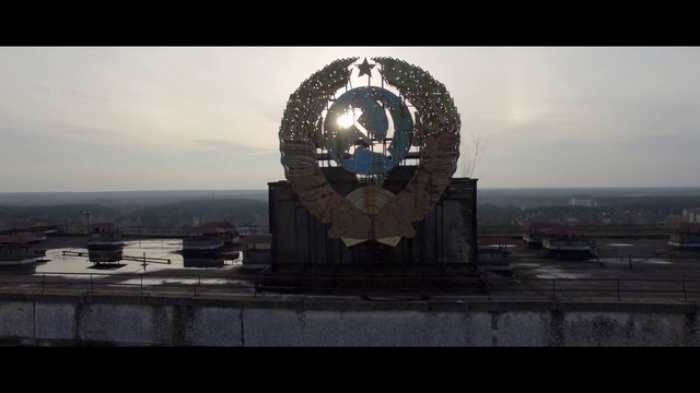 Video Reference: Landmark, Sky, Tower, Architecture, Historic site, Atmosphere, Clock tower, Photography, Monument, World, Clock, Sitting, Large, Photo, View, Light, Train, White, Table, Water, City, Man, Standing, Cloud, Screenshot, Skyscraper, Art