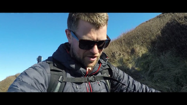 Video Reference: sunglasses, eyewear, vision care, glasses, mountainous landforms, sky, mountain, adventure, screenshot, cool, Person