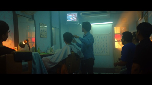 Video Reference: Snapshot, Photography, Fun, Scene, Screenshot, Movie, Person, Laptop, Man, Computer, Indoor, Looking, Front, Screen, Monitor, Using, Dark, Young, Sitting, Video, Desk, Lit, Boy, Television, Room, People, Table, Holding, Keyboard, Woman, Group, Remote, Standing, Train, Wii, Playing, Working, Human face, Clothing