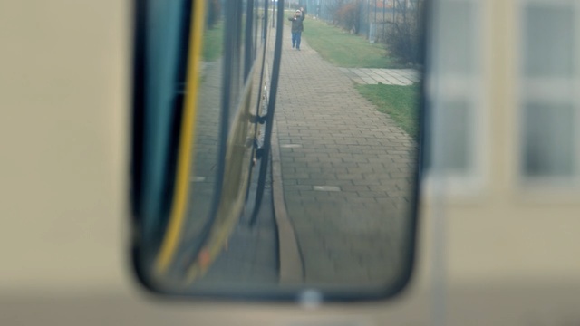 Video Reference: Mode of transport, Transport, Reflection, Line, Sky, Tree, Glass, Vehicle door, Auto part, Window, Person
