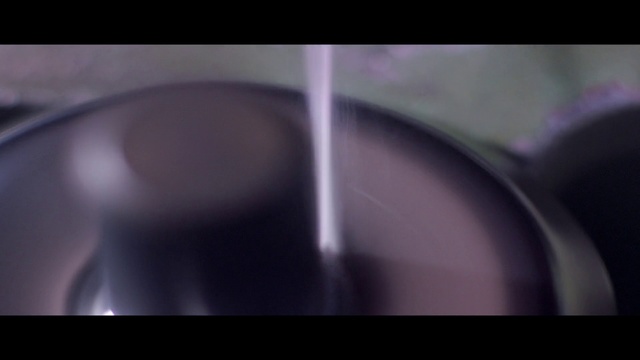 Video Reference: Close-up, Eyewear, Photography, Font, Macro photography, Circle, Darkness, Indoor, Sitting, Computer, Red, Photo, Small, Keyboard, Food, Black, Table, Close, Apple, White, Glass, Bowl, Desk, Holding, Cake, Cup, Plate, Mouse, Blurry, Cat, Screenshot, Abstract, Light, Blur