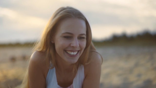 Video Reference: Hair, Face, Photograph, Facial expression, Smile, Beauty, Blond, Skin, Summer, Sky, Person