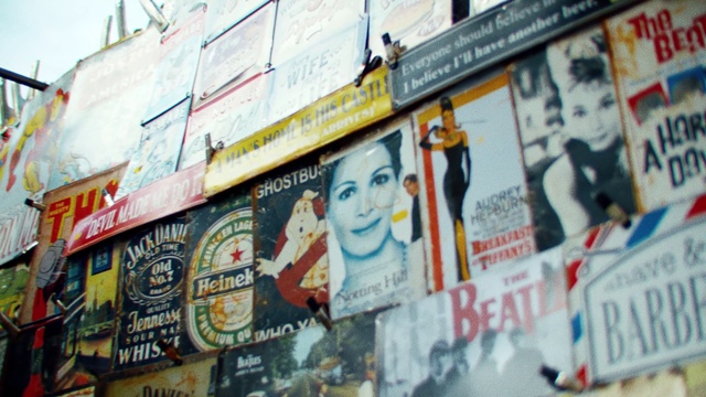 Video Reference: Advertising, Wall, Poster, Display advertising, Billboard, Mural, Art, Banner, Street art, Street