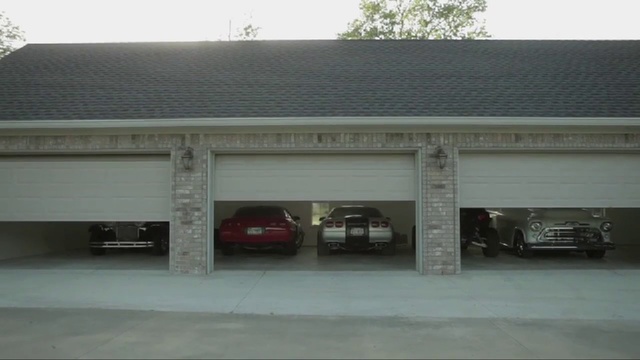 Video Reference: Property, Building, Vehicle, Luxury vehicle, Garage, Car, Real estate, Commercial building, Garage door, House