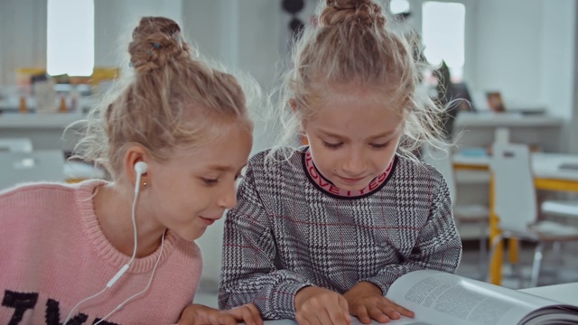 Video Reference: Child, Learning, Room, Adaptation, Classroom, Homework, Reading, Education, Student, Ear