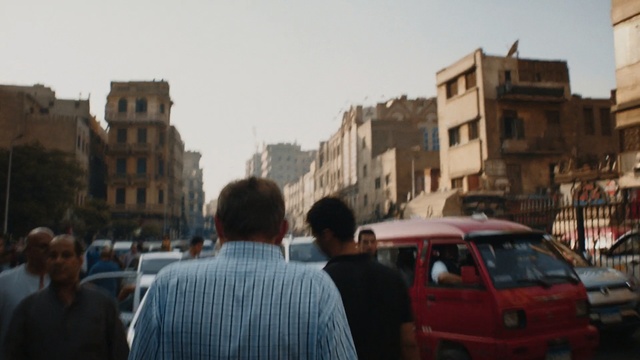 Video Reference: Land vehicle, Vehicle, Car, Mode of transport, Town, Transport, City car, Street, Travel, Traffic, Person