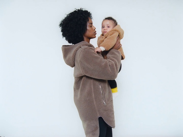 Video Reference: Shoulder, Joint, Hug, Standing, Interaction, Fashion, Human, Human body, Outerwear, Photography