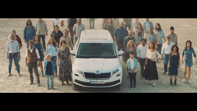Video Reference: Land vehicle, Vehicle, Car, Luxury vehicle, Transport, Automotive design, Minivan, Executive car, Person, People, Group, Standing, Child, Front, Bus, Walking, Posing, Young, Girl, Street, White, Large, Woman, Holding, Crowd, Man, Playing, Train, Airplane, Clothing, Text, Wheel