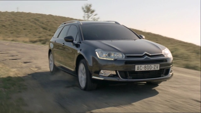 Video Reference: car, land vehicle, vehicle, motor vehicle, family car, automotive design, mid size car, vehicle registration plate, sport utility vehicle, sedan