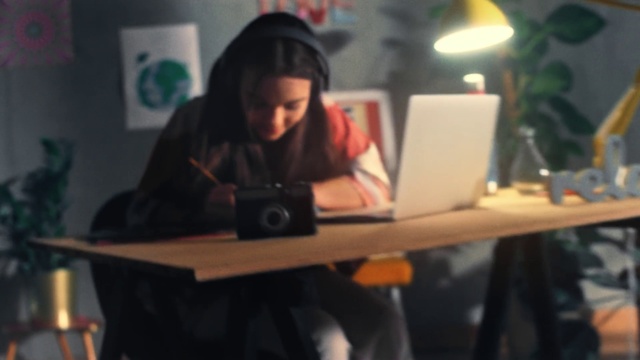 Video Reference: Table, Technology, Sitting, Room, Electronic device, Furniture, Black hair