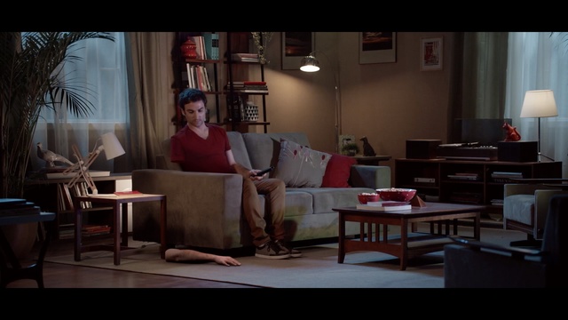 Video Reference: Living room, Room, Furniture, Couch, Sitting, Table, Screenshot, Photography, Conversation, Interior design, Person