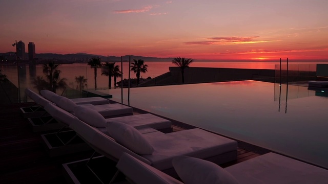 Video Reference: Water, Cloud, Sky, Plant, Afterglow, Dusk, Sunlight, Outdoor furniture, Tree, Red sky at morning