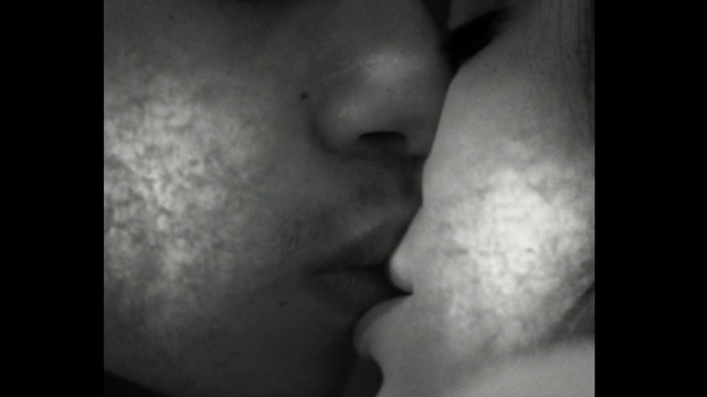 Video Reference: Face, Nose, Cheek, Skin, Lip, Close-up, Monochrome photography, Forehead, Mouth, Chin