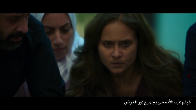 Video Reference: Face, Scene, Nose, Movie, Fun, Human, Cheek, Conversation, Mouth, Adaptation, Person, Indoor, Man, Photo, Looking, Table, Front, Sitting, Laptop, Cake, Screen, Couple, Posing, Woman, People, Computer, Birthday, Group, Standing, Young, Room, Shirt, Holding, Large, White, Cutting, Pizza, Screenshot, Human face, Portrait, Text, Girl, Clothing, Eyes, Staring