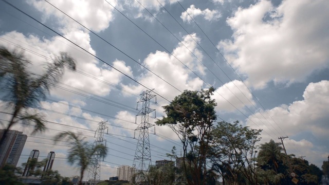 Video Reference: Sky, Cloud, Daytime, Nature, Vegetation, Cumulus, Tree, Overhead power line, Meteorological phenomenon, Atmosphere