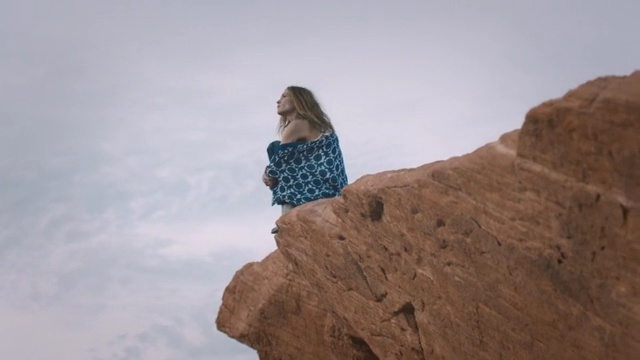 Video Reference: sky, rock, terrain, vacation, landscape, tourism, cliff, girl, formation