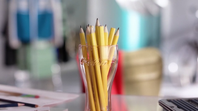 Video Reference: Yellow, Pencil, Office supplies, Writing implement, Stationery, Person