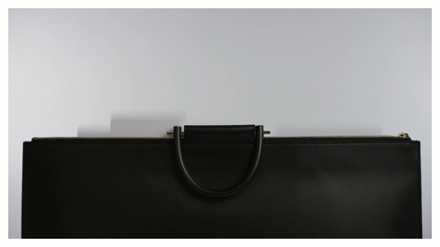 Video Reference: bag, product, handbag, product, brand, rectangle, leather